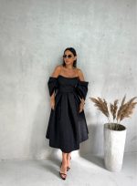 Midi elegantna crna svetlucava korset haljina A kroja sa spuštenim rukavima koji ležerno padaju