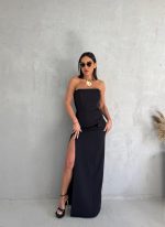 Uska duga crna top haljina sa dubokim šlicem sa strane i sa imitacijom džepova