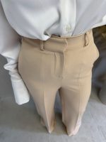 Zvonaste pantalone visokog struka u krem boji kosih džepova sa skrivenim rajsferšlusom