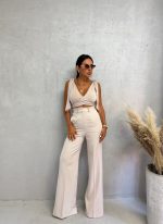 Zvonaste pantalone visokog struka nude boje peska