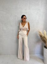 Zvonaste pantalone visokog struka nude boje peska