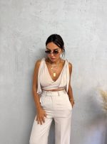 Zvonaste pantalone visokog struka nude boje peska