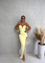 Puter pastelna žuta elegantna asimetrična korset haljina srcolikog dekoltea i dubokog šlica