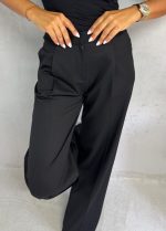 Crne trendi zvonaste pantalone plićeg struka sa kosim džepovima