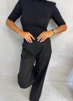 Crne trendi zvonaste pantalone plićeg struka sa kosim džepovima