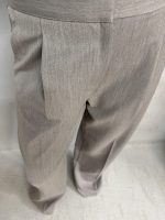 Sive trendi zvonaste pantalone plićeg struka sa kosim džepovima