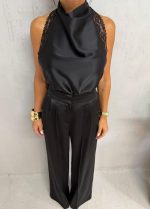 Elegantna crna satenska bluza sa čipkom